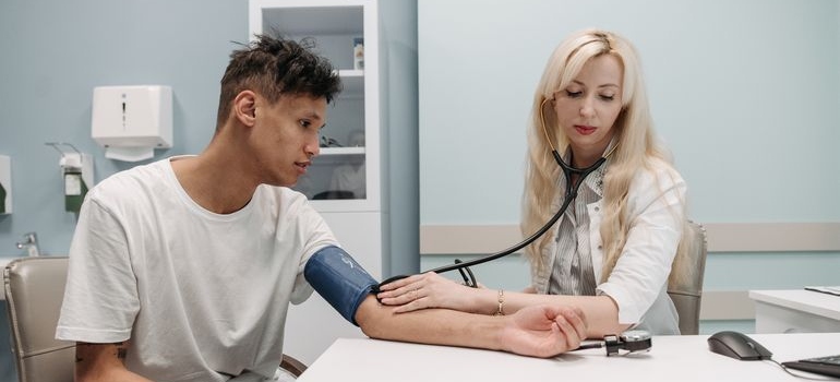 Man getting his blood pressure checked.