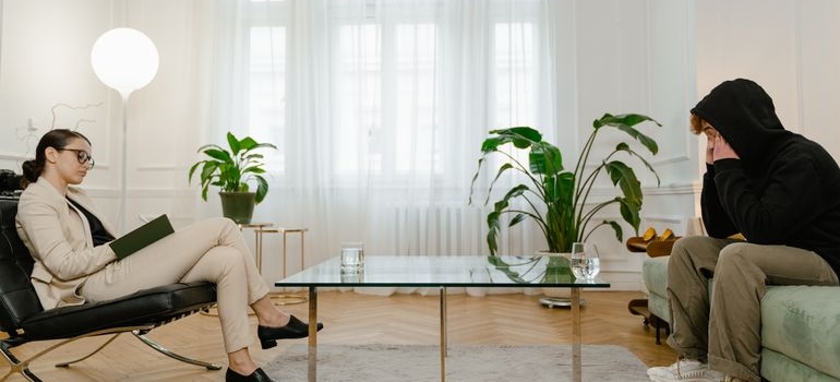 Patient speaking with a therapist during a supportive counseling session.