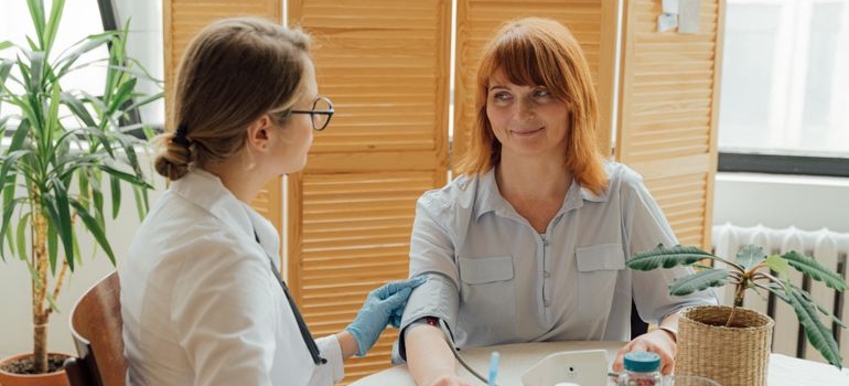 Doctor speaking with a patient about memory, thinking, and other health concerns.