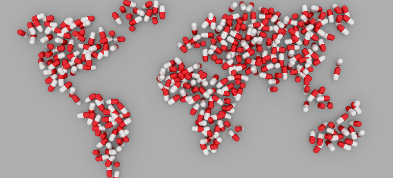 The world represented by prescription medication pills.