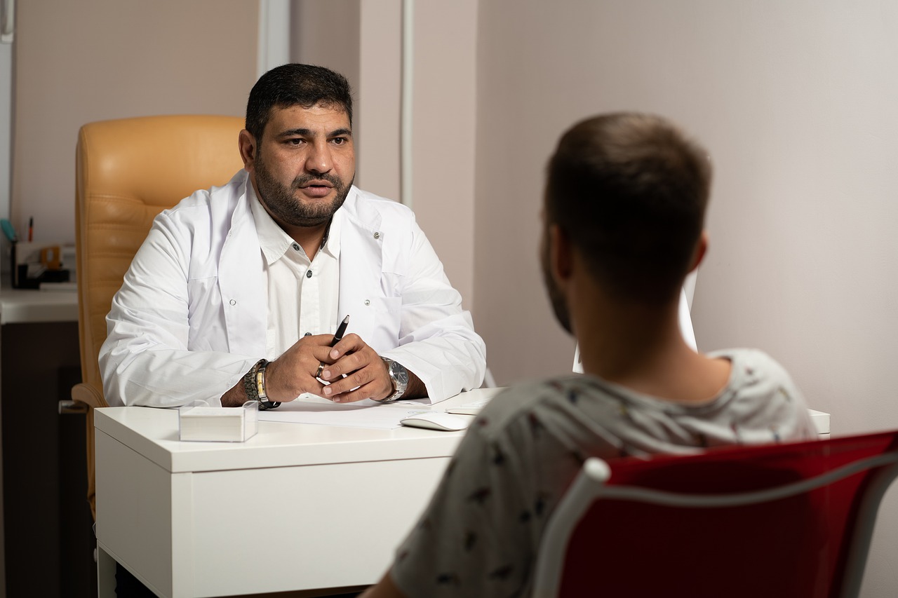 A doctor talking to a patient, representing best rehab near Princeton NJ