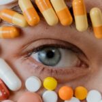 a person's eye surrounded by medications