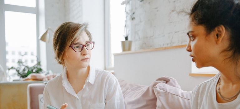 Therapist talking with a client about eating disorders and substance abuse during a counseling session.
