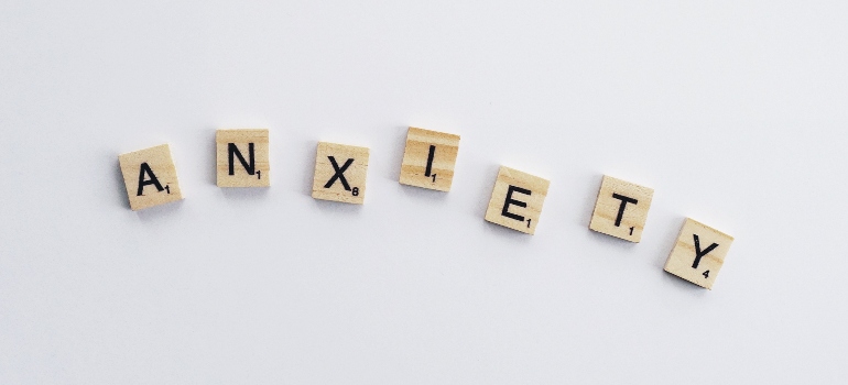 wooden blocks spelling the word "anxiety"
