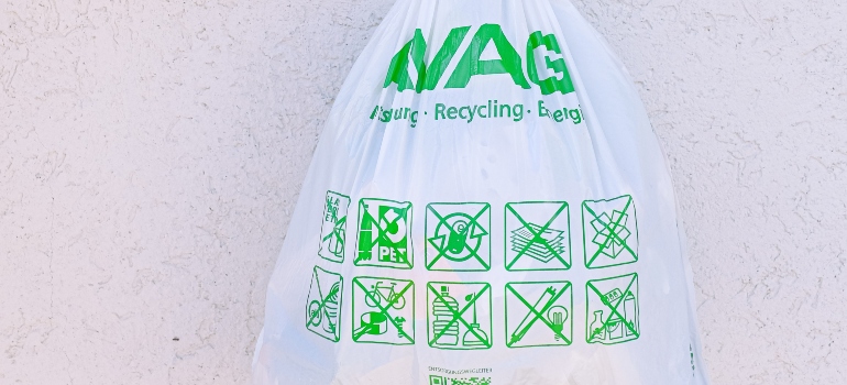 a recycling bag, promoting sustainability and addiction recovery