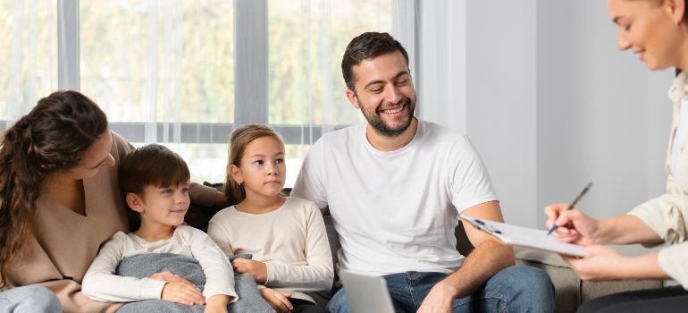 Young family participating in therapy