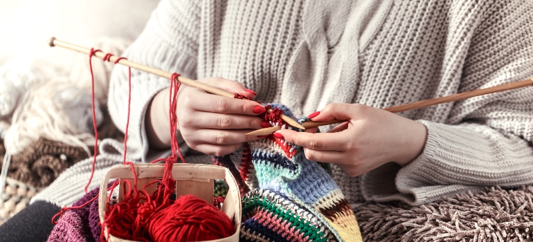 a woman knitting as a hobby