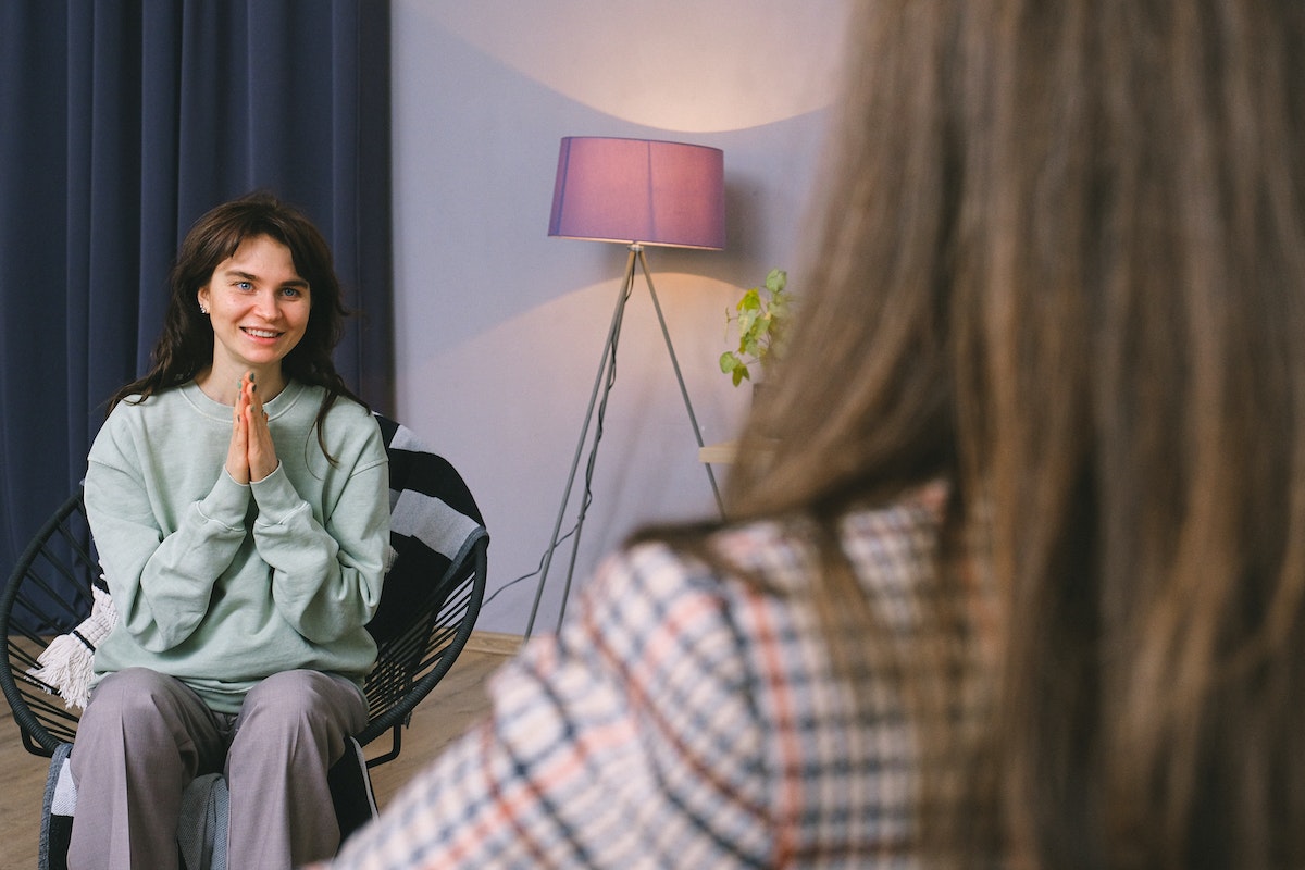 a woman talking to her psychologist