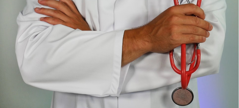 A close-up of a doctor wearing a stethoscope.