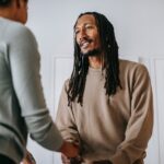 man and psychologist talking