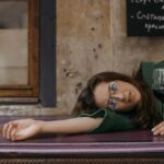 a young woman thinking about signs of substance abuse in young adults
