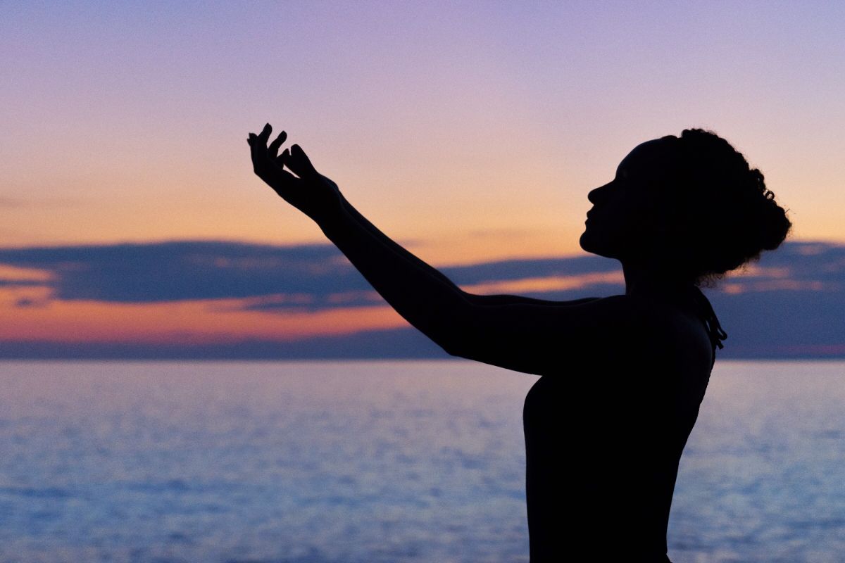 person practicing holistic healing during rehab