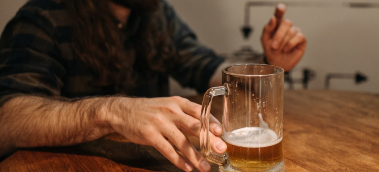 a person with a beer mug