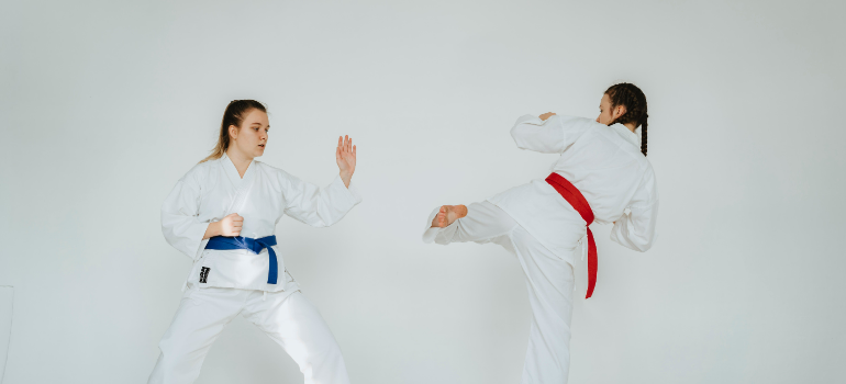 two woman training karate