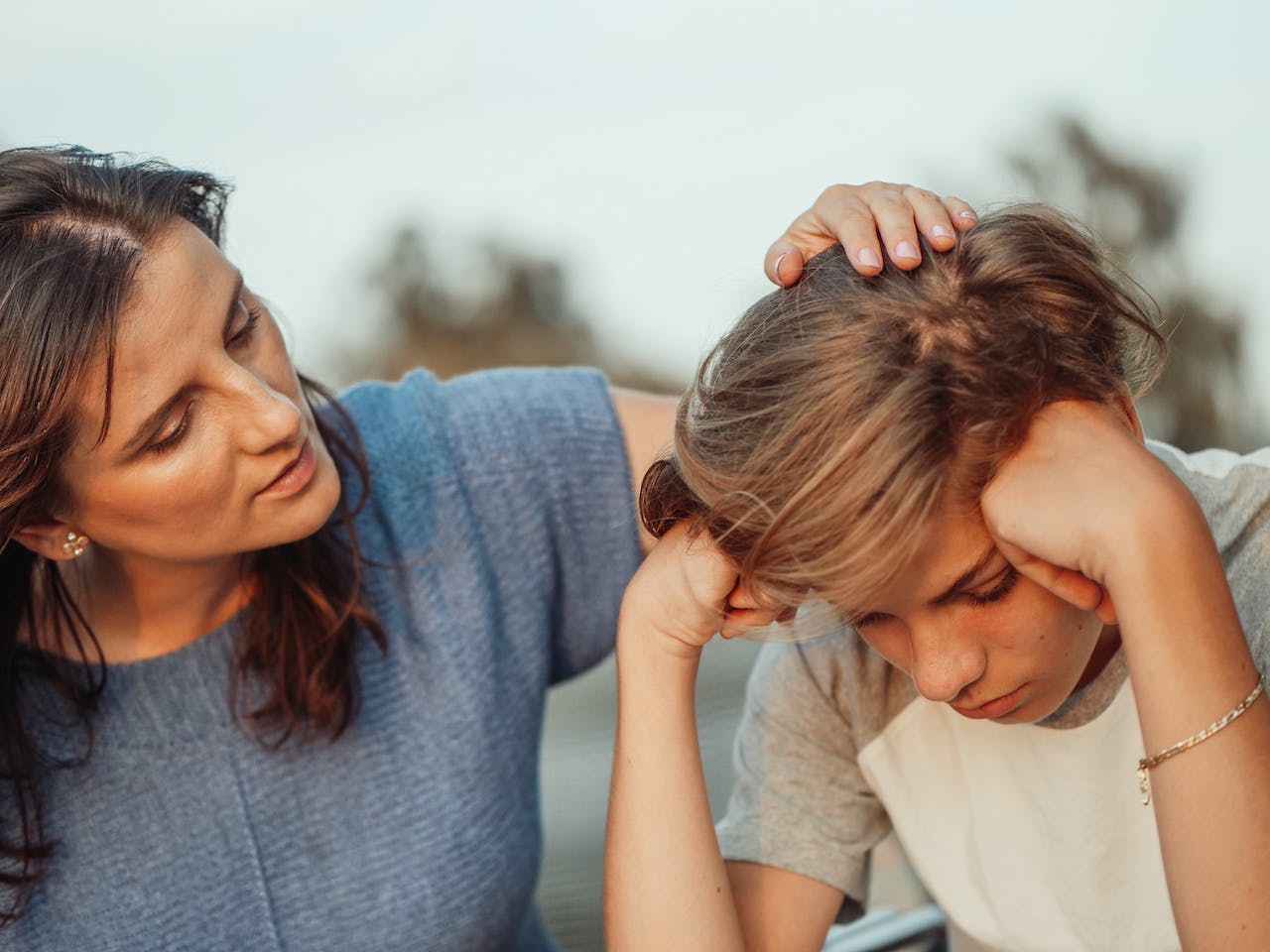 mother telling son coping strategies for Pennsylvania families dealing with a loved one's addiction