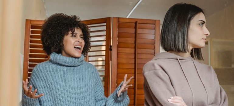 Two young women having an argument.