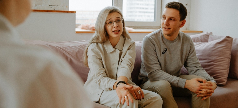 A man and a woman talking to a therapist about does your teen need marijuana addiction treatment 