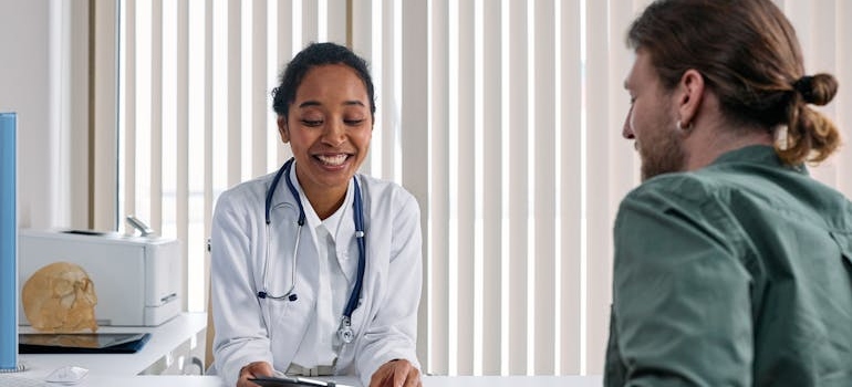 Doctor talking to her patient about cocaine nose.