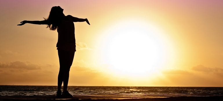 Silhouette of Woman Against during Golden 