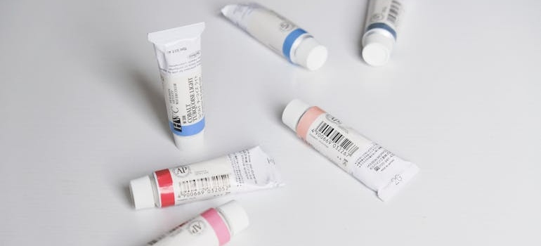 Small tubes of ointment on a white background.