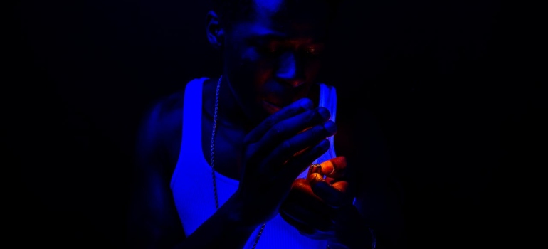 a man lighting a cigar 