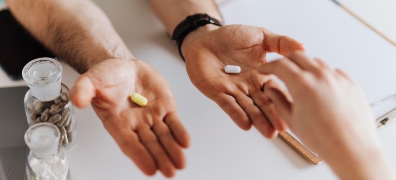 Doctor discussing medication with a patient during a medical consultation.