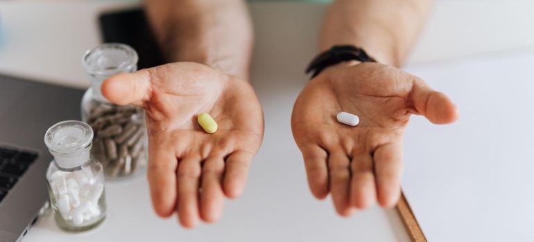 Doctor discussing OxyContin addiction and prescription medication with a patient.