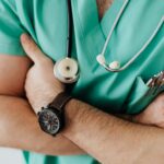 a doctor with his hands crossed