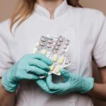 A person holding some medications as a symbol of Vyvanse addiction