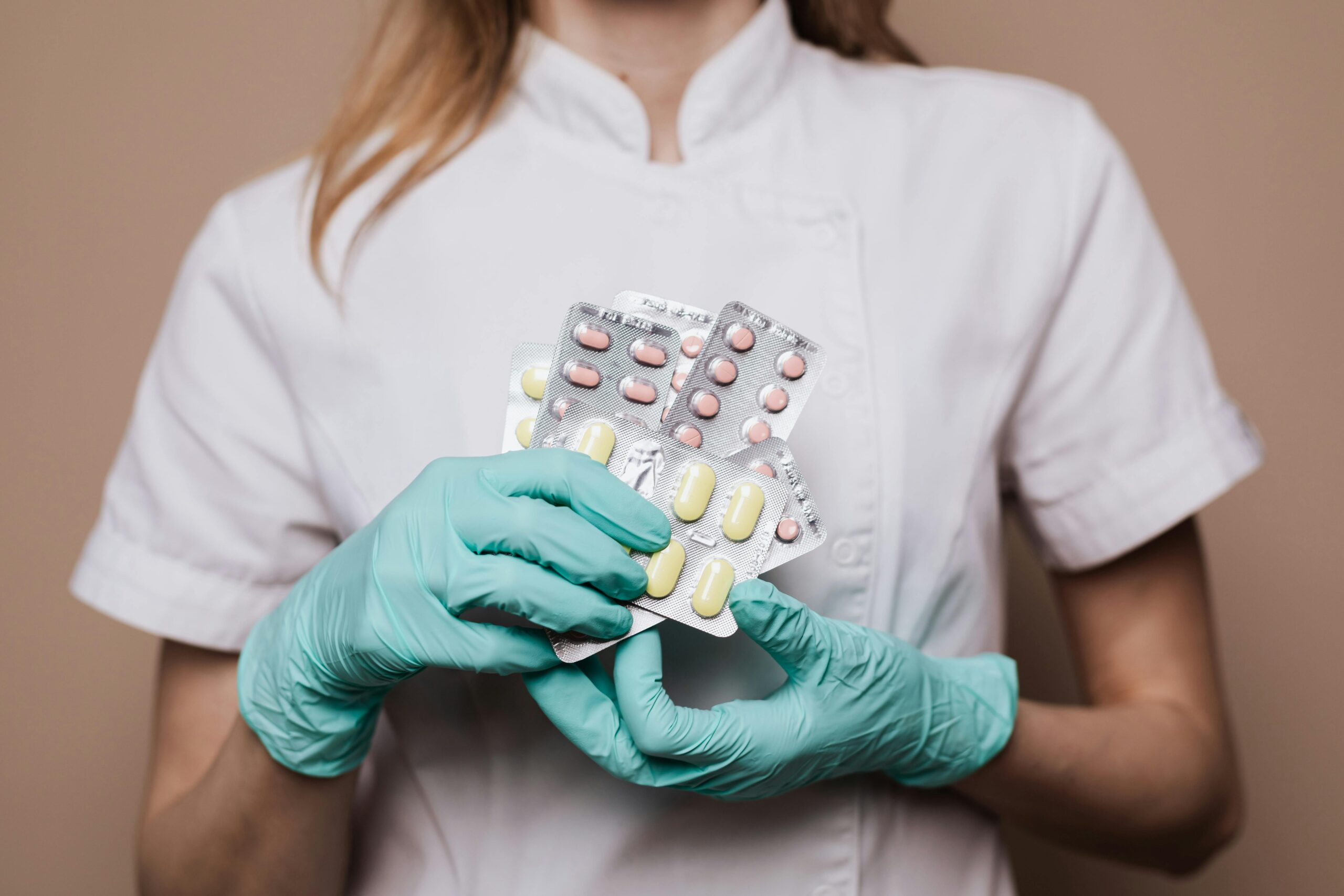 A person holding some medications as a symbol of Vyvanse addiction