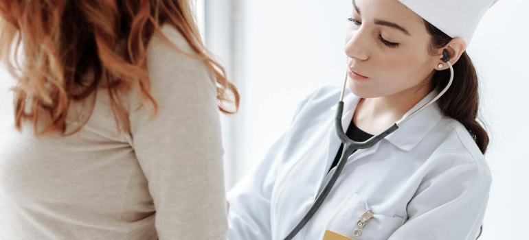 a doctor checking the patient 