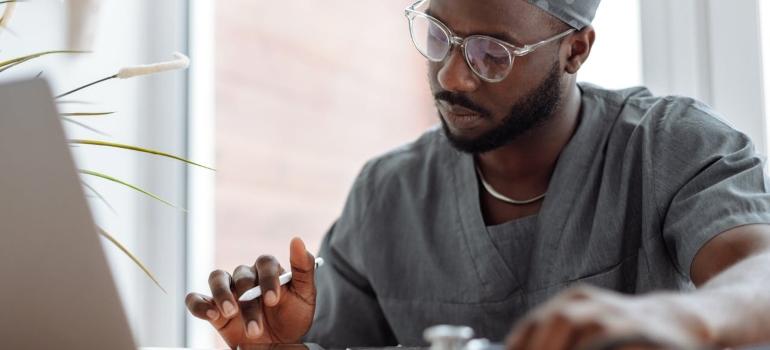 a doctor reading about doctor shopping 