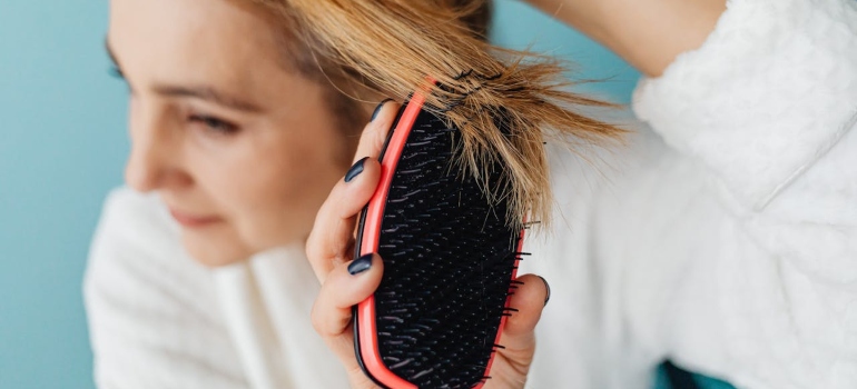 Woman brushing her hair