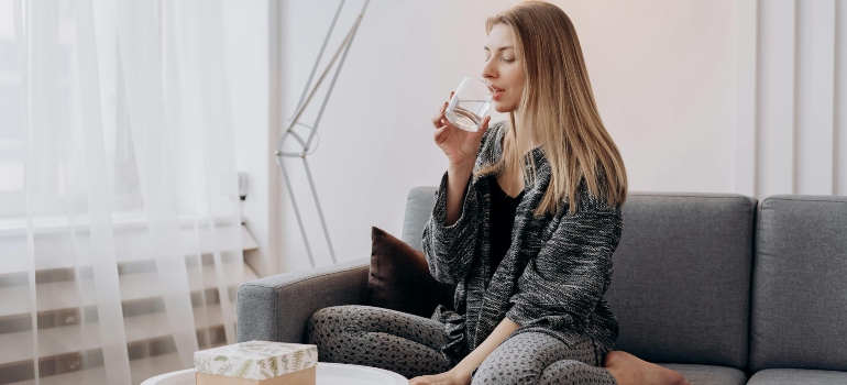 Woman drinking a glass of water