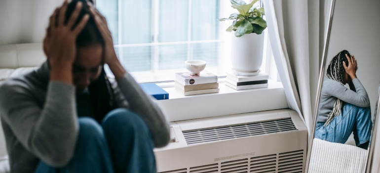 Woman under stress feeling anxious