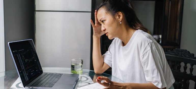 Woman feeling stress due to money management in recovery