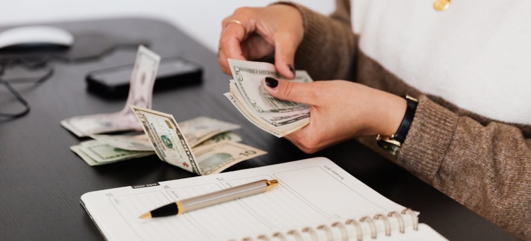 a woman counting money 