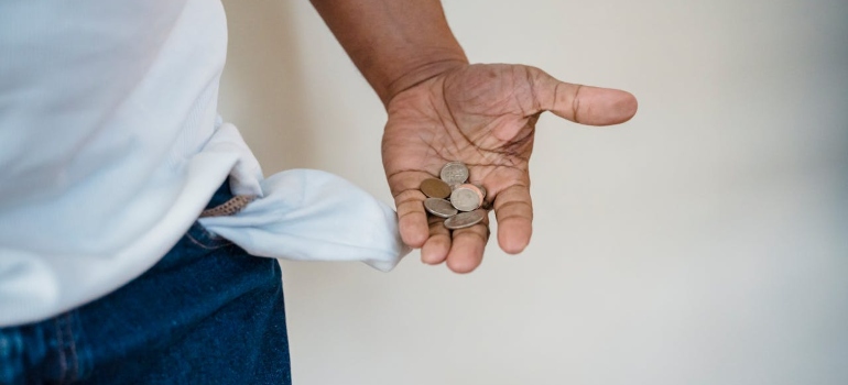 Man holding coins