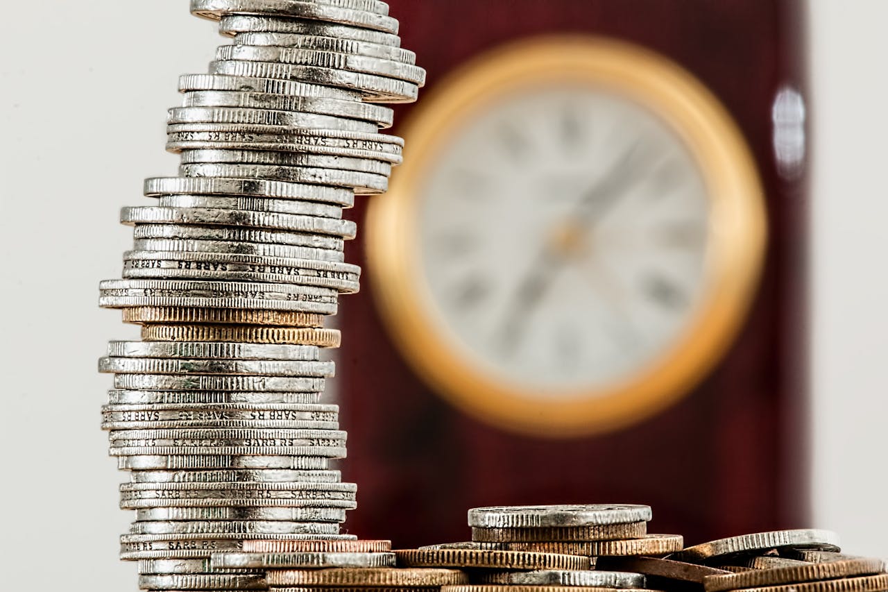 a pile of coins as a symbol of money management in addiction recovery