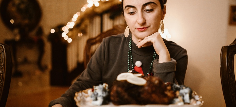 Woman looking at the holiday dessert.