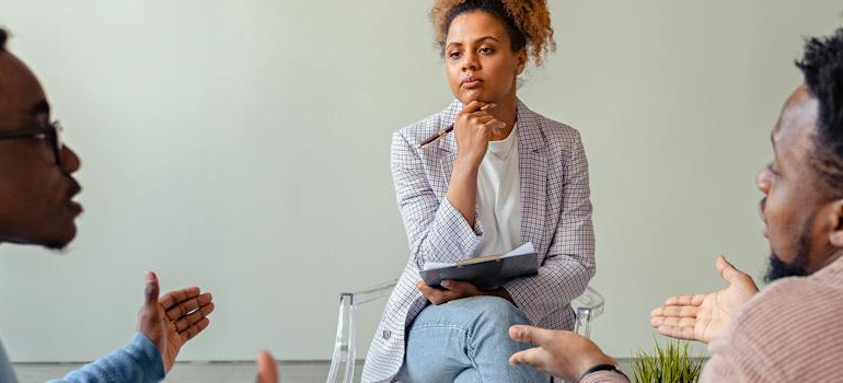 Couple attending a psychotherapy session for holiday sobriety. 