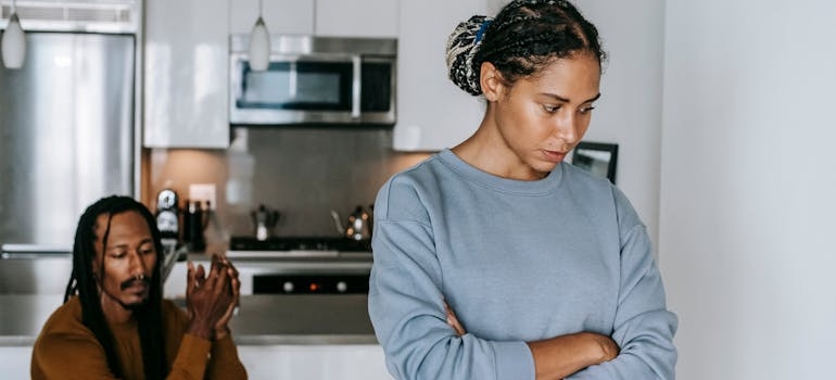 Couple discussing their boundaries and working on repairing relationships after addiction.