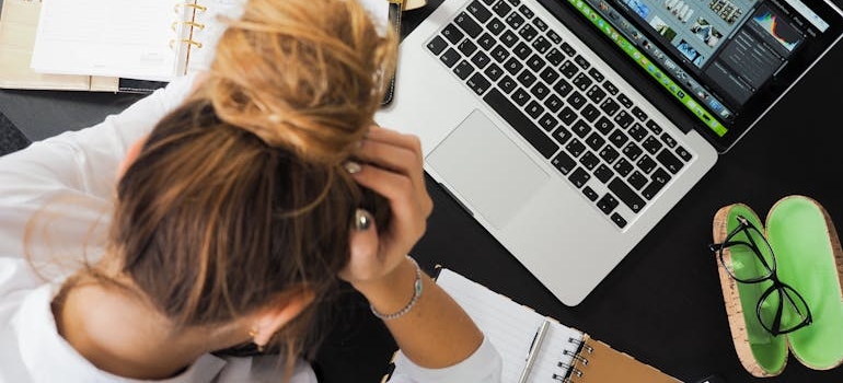 Woman looking at her laptop.