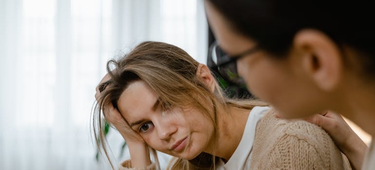 Woman supporting her friend through addiction.