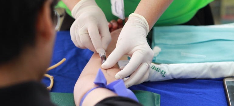 Person getting their blood drawn.