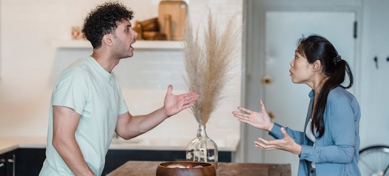 Couple fighting in their living room.