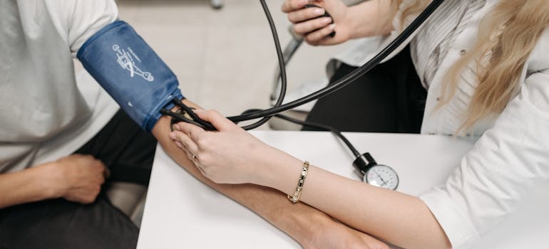 Person getting their blood pressure checked.