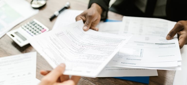 Person reviewing documents.