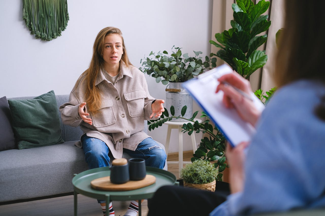 Woman talking to a therapist.