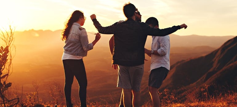 Friends walking in nature and laughing.